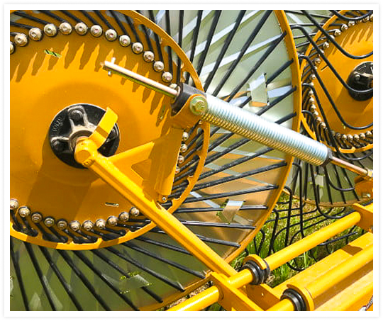 Patented rake wheel suspension